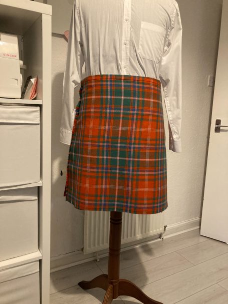 Bespoke Kilt Reconstruction Bespoke kilt alteration involving full reconstruction, reshaping, and adjustment for a perfect fit.