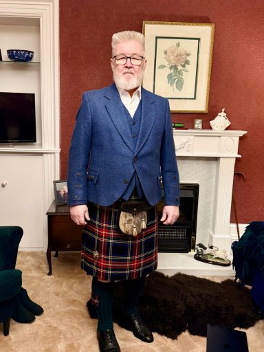 Full Highland Outfit Alteration - Finished Fit Customer wearing altered kilt, jacket, and waistcoat.