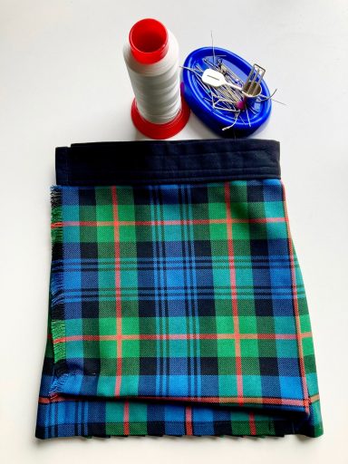 Bespoke Baby KIlt finished bespoke baby kilt with sewing tools